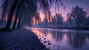 Tranquil River at Dusk Reflecting Willow Trees in Soft Light photo