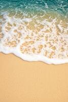 Waves gently lapping on sandy beach under clear water. Pure water unpolluted concept. photo