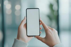 Mobile phone held by hands, screen ready for use. photo