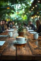 Casual business team discussing strategy around a table with coffee mugs, minimal background, photo