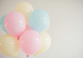 A delightful display of pastel-colored balloons, creating a cheerful and festive atmosphere. photo