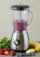 A blender preparing a vibrant, healthy smoothie with fresh ingredients, ready to enjoy. photo