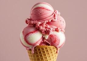 A close up shot of an ice cream cone with multiple scoops of strawberry vanilla ice cream. photo
