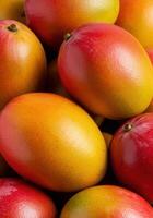 Close up view of a stack of fresh, ripe, and colorful mango fruits. photo