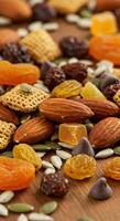 A delicious and healthy mix of nuts, dried fruits and seeds, perfect for a snack. photo