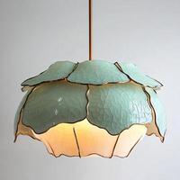 Elegant Decorative Ceiling Light Fixture with Crackled Glaze Texture and Copper Accents Illuminating a Room Interior with Sophisticated Style and Warm Glow photo