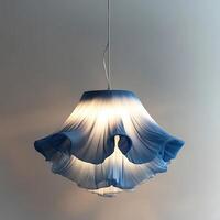Elegant Blue Fabric Pendant Light Fixture Hanging from Ceiling Emitting Soft Glow Creating Atmospheric Interior Lighting Displaying Modern Home Decor and Design photo