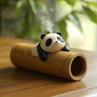 Adorable Panda Humidifier Emitting Vapor While Resting on Bamboo Log on Wooden Surface Creating a Relaxing and Peaceful Atmosphere at Home Interior Decor photo