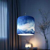 Elegant blue and white patterned pendant light illuminating a modern interior, casting a warm glow, complemented by minimalist decor and serene ambiance in soft light setting photo