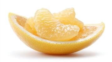 Bright Yellow Grapefruit Segments on White Background photo