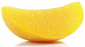 Close Up of a Sweet Yellow Honeydew Melon Slice on White Background photo
