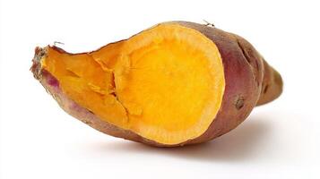 Closeup of a Crunchy Baked Orange Sweet Potato on White Background photo