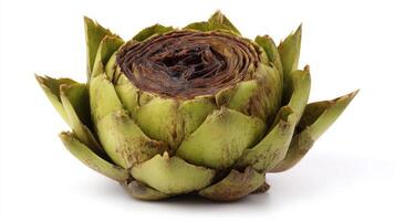 Closeup of a Green Artichoke on White Background photo
