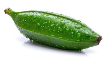 Closeup of a Plump Green Plantain with Water Drops on White Background photo