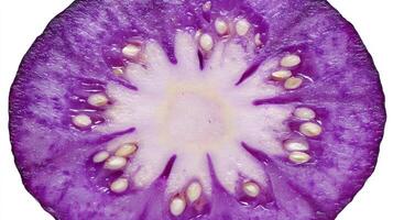 Closeup of a Ripe Purple Eggplant Slice on White Background photo