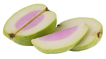 A Juicy Pink and Green Guava Fruit Slices Isolated on White Background photo