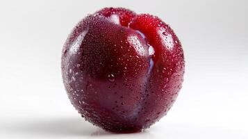 A Juicy Purple Plum with Water Drops on White Background photo