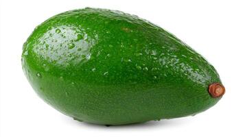 Green Avocado with Water Droplets on White Background photo