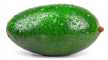 a Green Avocado with Water Droplets on White Background photo