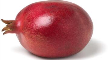 1 Red Pomegranate Isolated on White Background photo