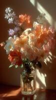 Brightly colored floral arrangement in a glass vase illuminated by soft sunlight photo