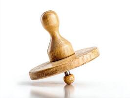 Wooden Spinning Top Toy on White Background photo