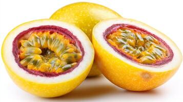Bright Yellow Passion Fruit Halves and Whole Fruit on White Background photo