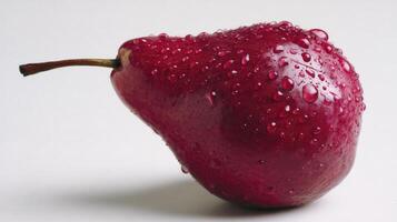 Closeup of a Ripe Red Anjou Pear with Water Drops on White Background photo