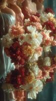 Group of women in elegant gowns holding vibrant flower bouquets reflecting in tranquil water photo