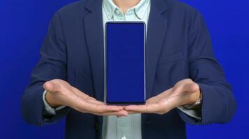 Person Presenting Mobile Phone With Blank Screen photo