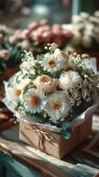 Beautiful flower arrangement in a gift box with seasonal blooms and greenery at a floral shop in daylight photo