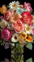 Colorful floral arrangement in a clear vase showcasing vibrant blooms at a modern indoor setting photo