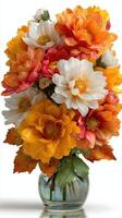 Colorful floral arrangement in a glass vase showcasing vibrant flowers at a sunny indoor location photo