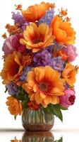 Vibrant floral arrangement with orange and purple blooms in a glass vase on a white background photo