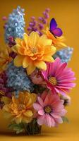 Bright and vibrant bouquet of flowers with a butterfly on a yellow background in a cozy setting photo