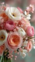 Colorful bouquet of blooming flowers in soft pastel shades arranged beautifully for spring decor photo
