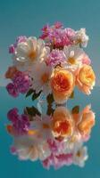 Bright bouquet of colorful flowers reflecting beautifully on a serene surface in vibrant daylight photo