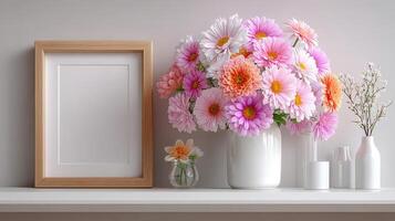 Colorful floral arrangement on a shelf with empty frame and decorative vases photo