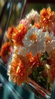 Colorful flowers in vintage car window provide a vibrant display on a sunny day photo