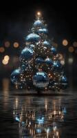 Christmas tree adorned with shiny blue ornaments and lights reflecting on a dark surface during a winter evening photo
