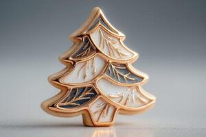 Decorative golden tree ornament designed with intricate leaf patterns for a festive touch during the holiday season photo