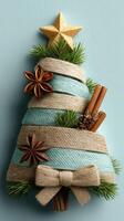 Unique handmade Christmas tree decoration featuring natural elements and rustic charm in a festive arrangement photo
