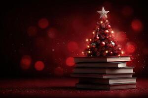 Christmas tree decorated with ornaments on top of a stack of books in a cozy setting during the holiday season photo