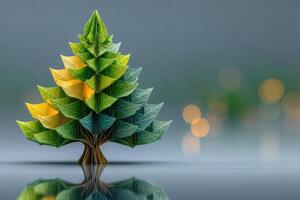 Colorful origami tree crafted from paper displaying green and yellow hues in a serene setting photo