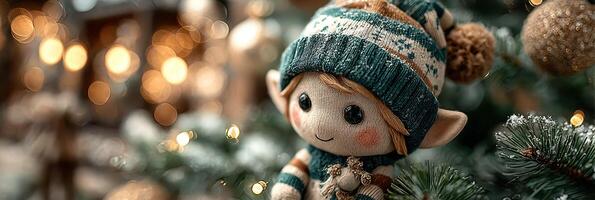 Festive elf doll adorned in cozy winter attire among twinkling lights on a Christmas tree photo