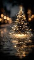 Christmas tree illuminated with sparkling lights reflecting on wet pavement during winter night photo
