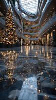 Sparkling holiday decorations illuminate a grand shopping center in the evening photo