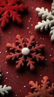 Festive decorations with intricate snowflake designs on a red background for seasonal celebrations photo