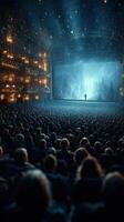 Audience captivated by performance in stunning theater with dramatic lighting and enchanting background scenery photo