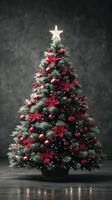Elegant Christmas tree adorned with red decorations and a bright star against a dark backdrop photo